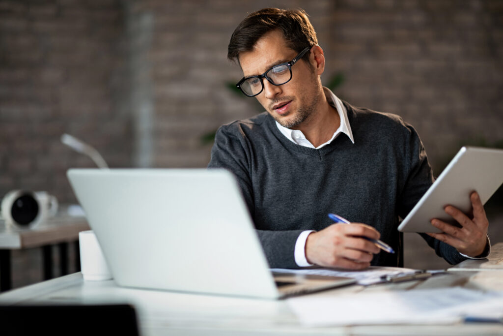 Businessman using legacy document creation processes